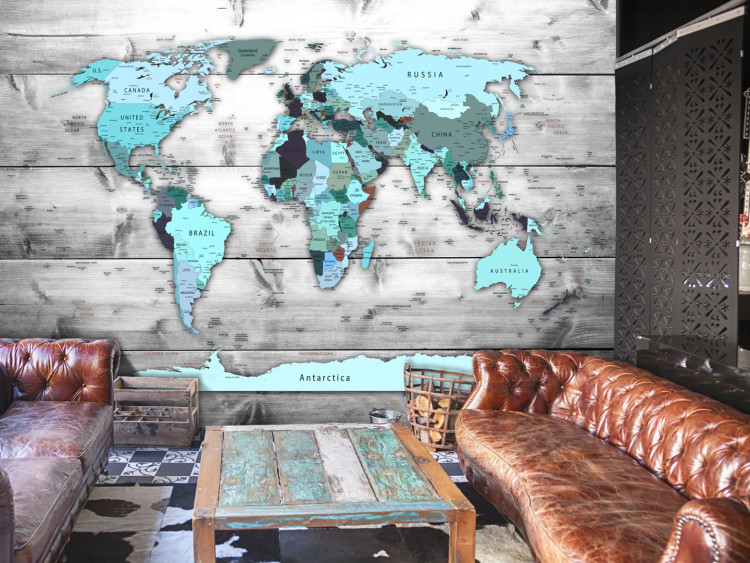 Fototapeta Świat na niebiesko - mapa świata w niebieskich barwach na drewnie