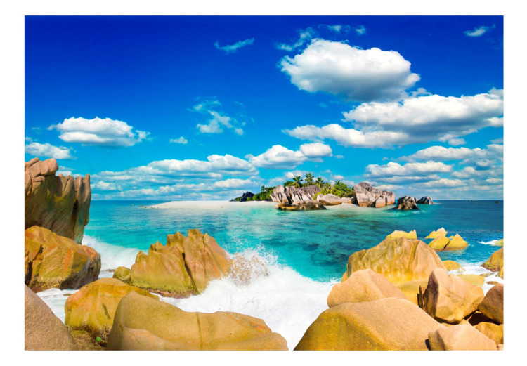 Fototapeta Bezludna wyspa - pejzaż z morzem z turkusową wodą skałami i palmami 61702 additionalImage 1