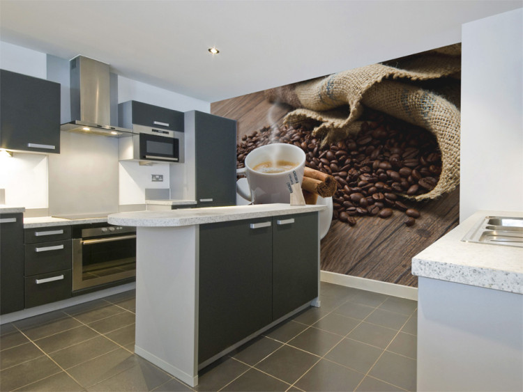 Wall Mural Coffee - grains scattered near cup on wooden background for kitchen 60212