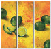 Canvas Art Print Still Life (3-piece) - Composition with limes on an orange background 48462