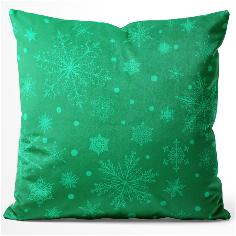 Decorative Velor Pillow Dancing snowflakes - festive motif on a green background 148513
