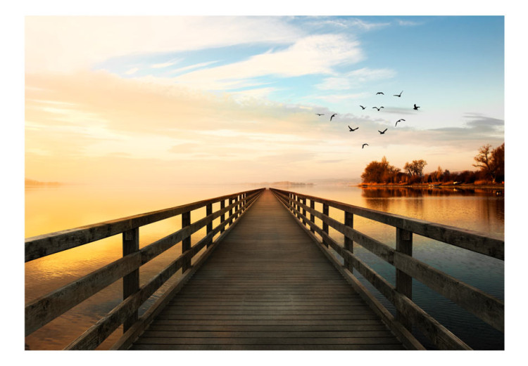 Wall Mural Landscape - a bridge over a calm lake surrounded by birds and trees 91613 additionalImage 1