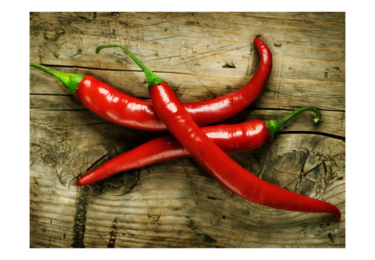 Wall Mural Spicy Flavours - Chili Peppers with Stems on a Wooden Board 59823 additionalImage 1