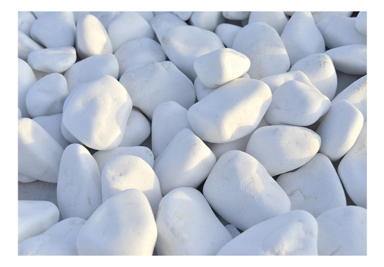 Photo Wallpaper Stony beach - patterned background of solid white stones in sunlight 62453 additionalImage 1