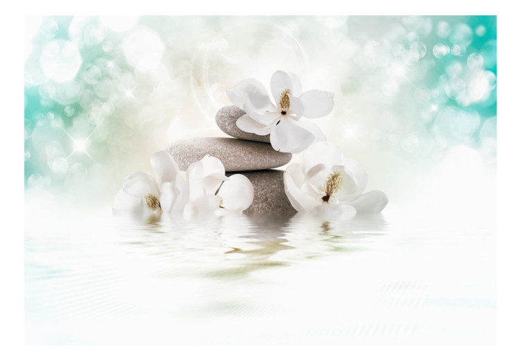 Carta da parati Oriente - motivo di fiori di magnolia con pietre zen su sfondo blu 87844 additionalImage 1