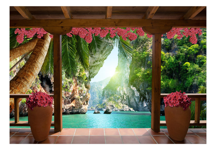 Fototapeta Tropikalny widok - pejzaż z turkusową wodą otoczoną palmami i kwiatami 129105 additionalImage 1