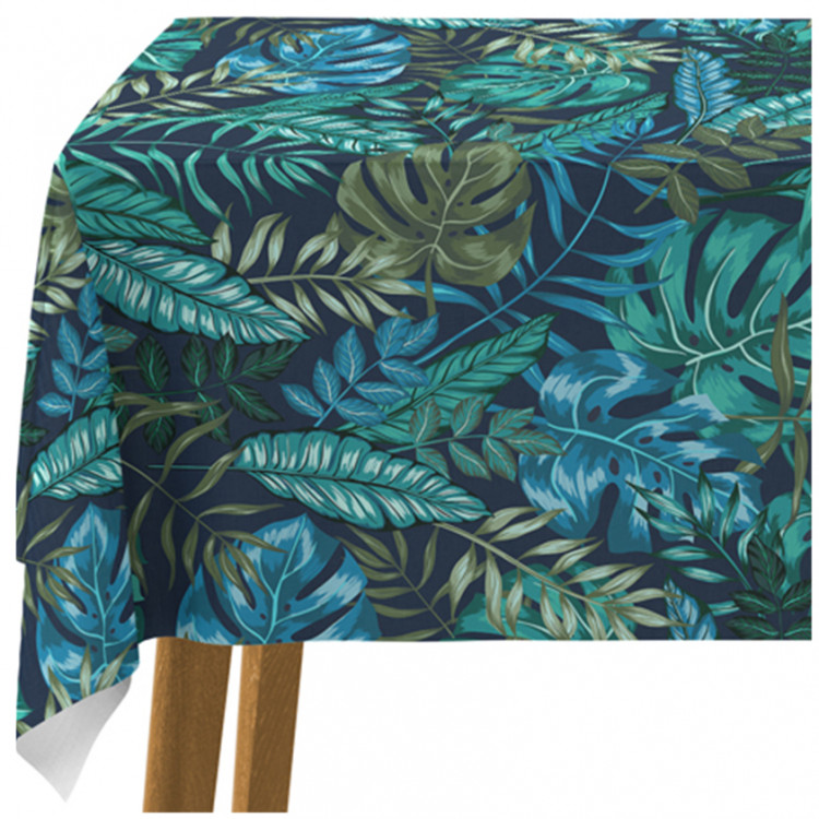 Mantel Monstera in blue glow - plant motif with exotic leaves 147246