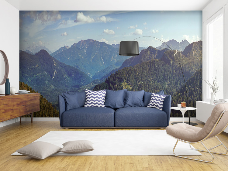 Wall Mural Mountain magic - landscape with high peaks surrounded by blue sky