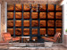 Photo Wallpaper A moment of pleasure - symmetrically arranged chocolate pralines on a black tray made of firewood 129897