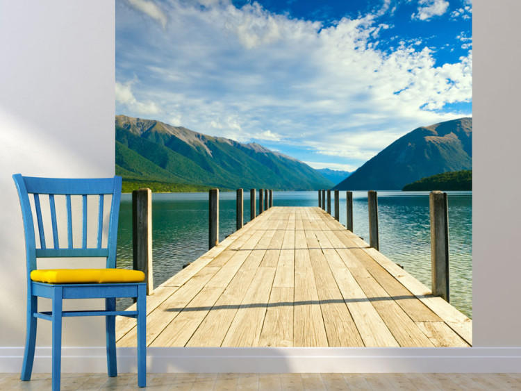 Wall Mural Mountain Lake Pier - Landscape of Mountains under a Bright Blue Sky 60258
