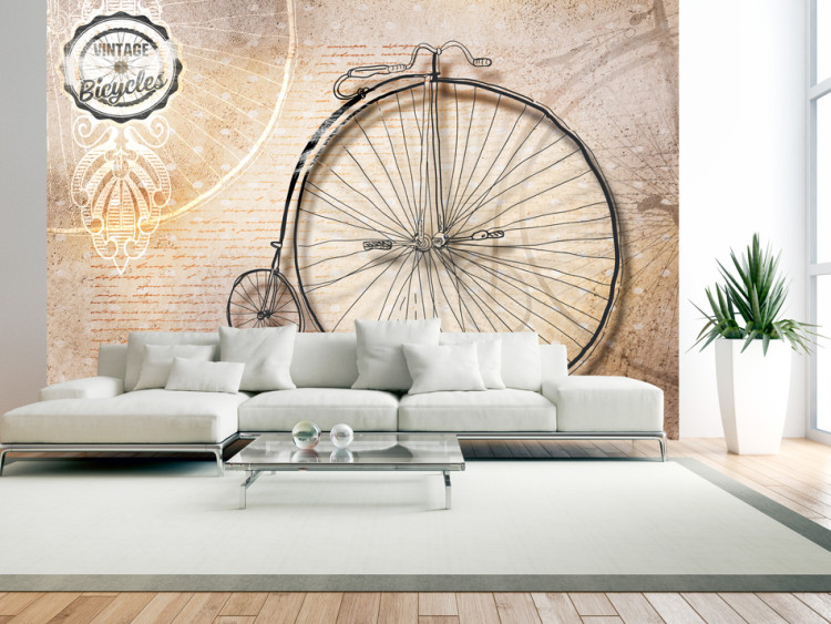 Wall Mural Vintage Bicycle - Old retro-style bicycle with a big wheel in sepia 61168