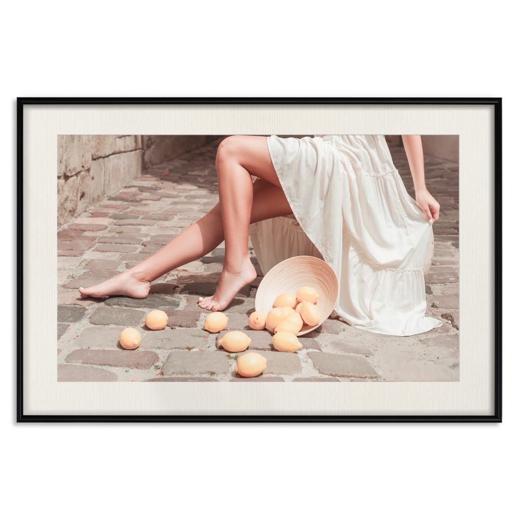 Muur Posters Lemons In The Sun - Scattered Fruit Against The Background Of A Seated Woman