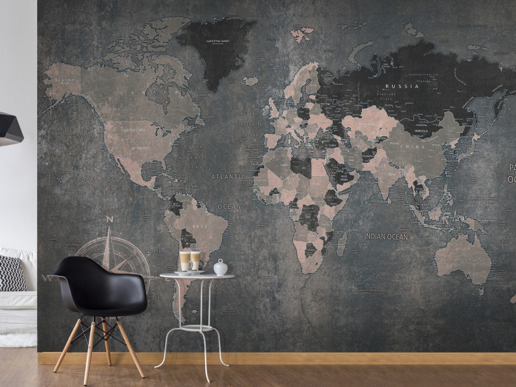 Fototapeta Szary świat - mapa kontynentów na niejednolitym tle z kompasem w rogu